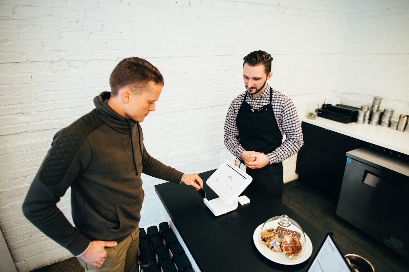 Consulting workspace with planning materials and devices